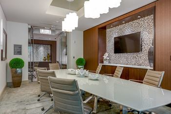 Private dining/conference room seats 10 with presentation capability